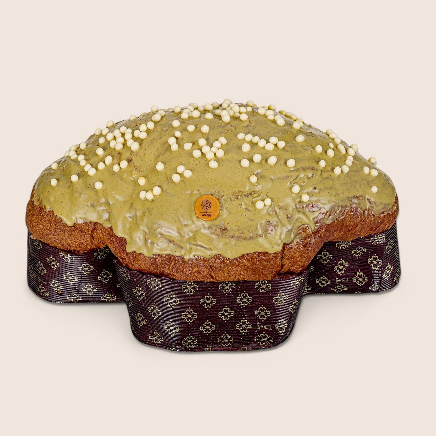 Artisanal Pistachio Colomba, with a jar of artisanal pistachio spread